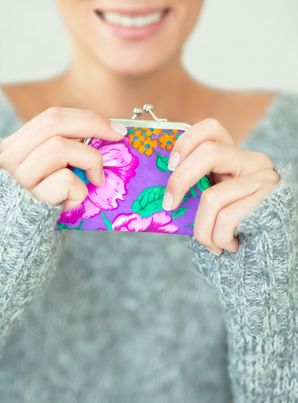 Woman Holding a Coin Purse